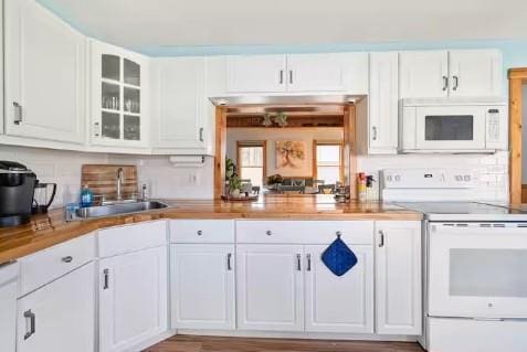 7181 County Highway 7, Roscoe, NY 12776 - kitchen with white appliances, a sink, glass insert cabinets, white cabinets, and light countertops