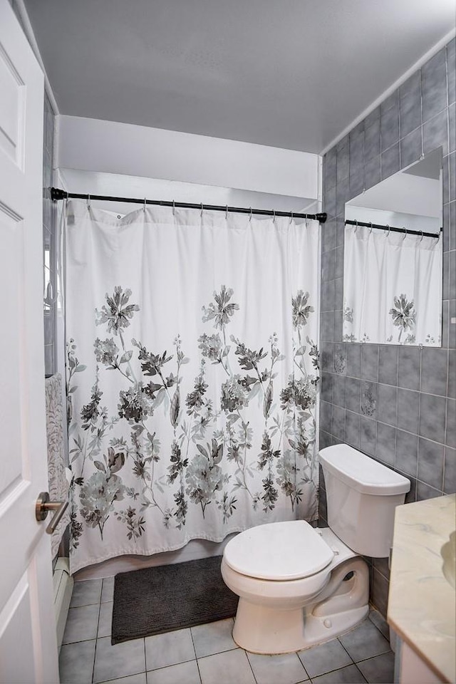 21 Potter Ln, Levittown, NY 11756 - full bath with toilet, tile walls, tile patterned flooring, curtained shower, and vanity
