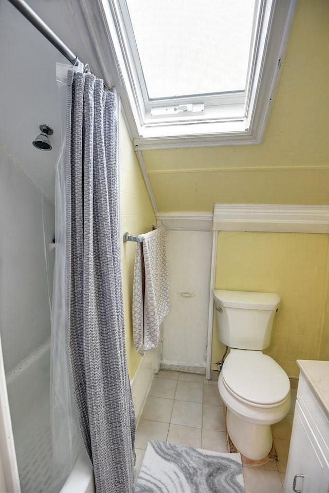 21 Potter Ln, Levittown, NY 11756 - full bathroom featuring shower / tub combo with curtain, tile patterned flooring, toilet, and a skylight