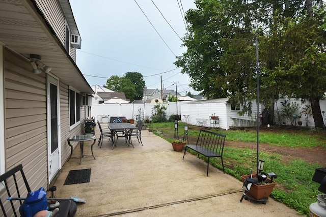 21 Potter Ln, Levittown, NY 11756 - view of patio / terrace featuring outdoor dining space and a fenced backyard