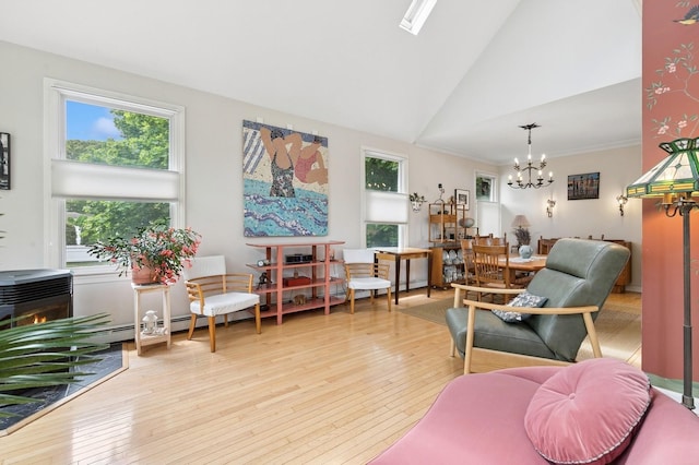 91 Soundview Dr, Rocky Point, NY 11778 - living room featuring a chandelier, plenty of natural light, light wood-style floors, and high vaulted ceiling