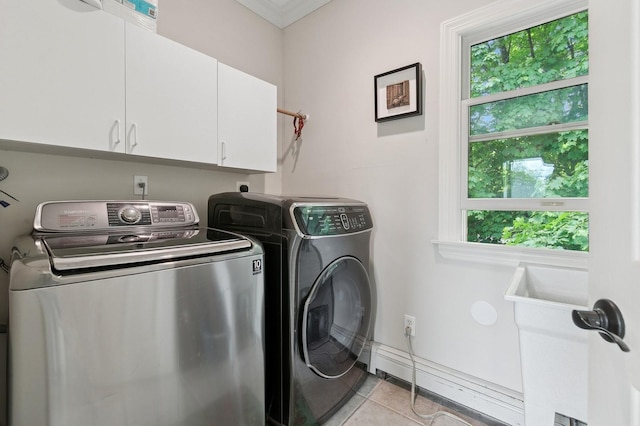 91 Soundview Dr, Rocky Point, NY 11778 - clothes washing area featuring cabinet space, washing machine and clothes dryer, and light tile patterned floors