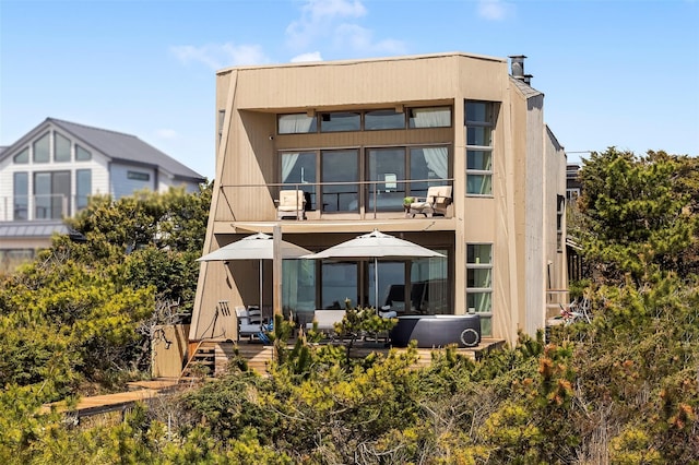 592 Ocean Walk, Fire Island Pines, NY 11782 - back of house featuring a balcony