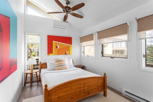 592 Ocean Walk, Fire Island Pines, NY 11782 - bedroom featuring a baseboard radiator, a wall mounted air conditioner, lofted ceiling, baseboards, and wood finished floors
