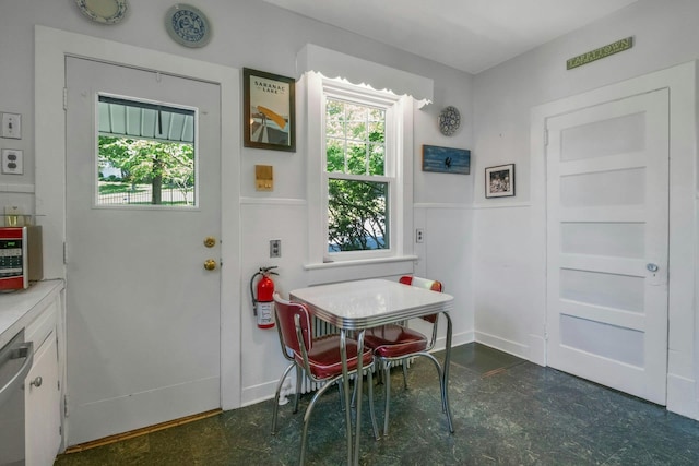 65 Hamilton Pl, Tarrytown, NY 10591 - dining space featuring a wainscoted wall and tile patterned floors