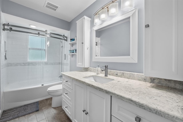 full bathroom featuring toilet, visible vents, vanity, and shower / washtub combination
