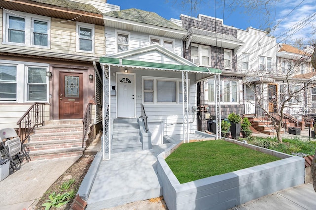 townhome / multi-family property with entry steps