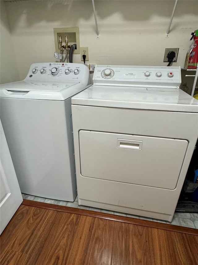 laundry room with washer and dryer