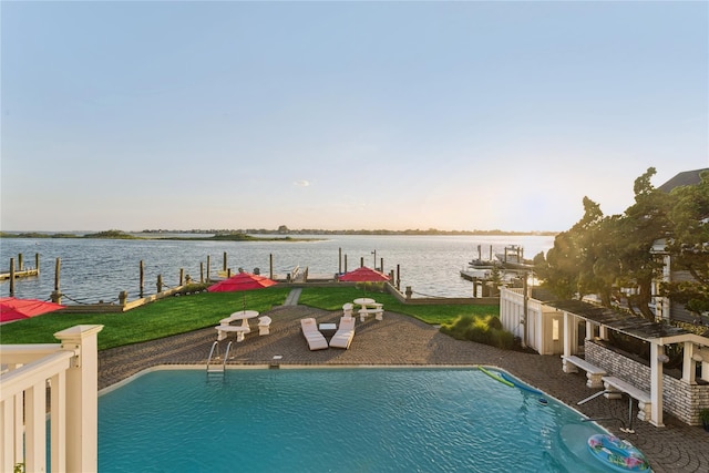 894 S Long Beach Ave, Freeport, NY 11520 - pool at dusk with a boat dock, a water view, and an outdoor pool