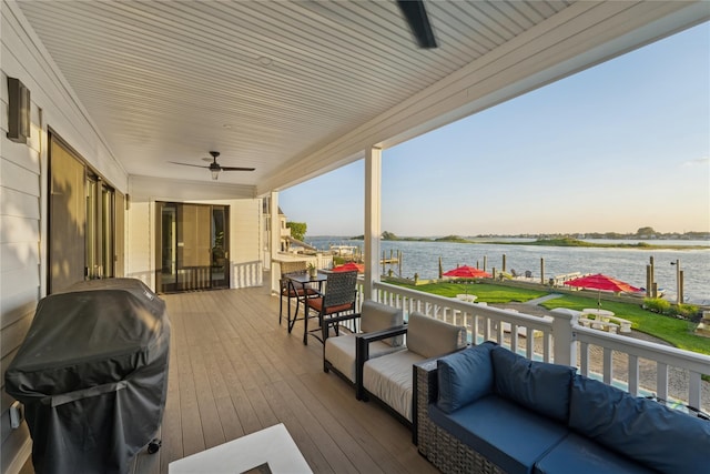 894 S Long Beach Ave, Freeport, NY 11520 - deck featuring a water view, ceiling fan, and area for grilling