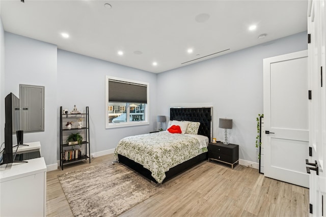 894 S Long Beach Ave, Freeport, NY 11520 - bedroom featuring light wood finished floors and recessed lighting