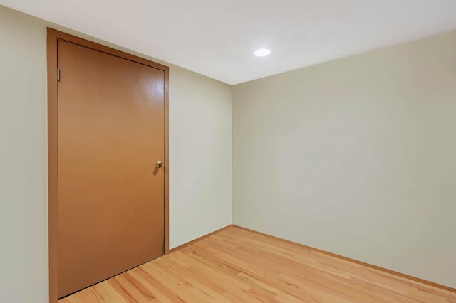 unfurnished bedroom featuring light wood-style flooring and recessed lighting