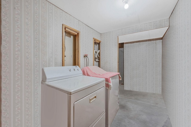 laundry room with washer hookup and wallpapered walls