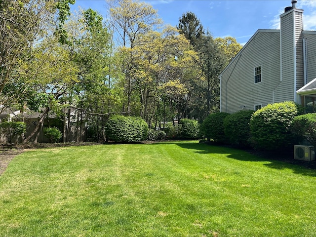 view of yard featuring ac unit
