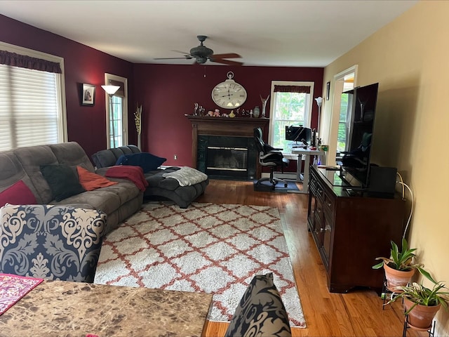 36VANDERBILT 36 Vanderbilt Ave, Saint James, NY 11780 - living area featuring wood finished floors, ceiling fan, and a glass covered fireplace