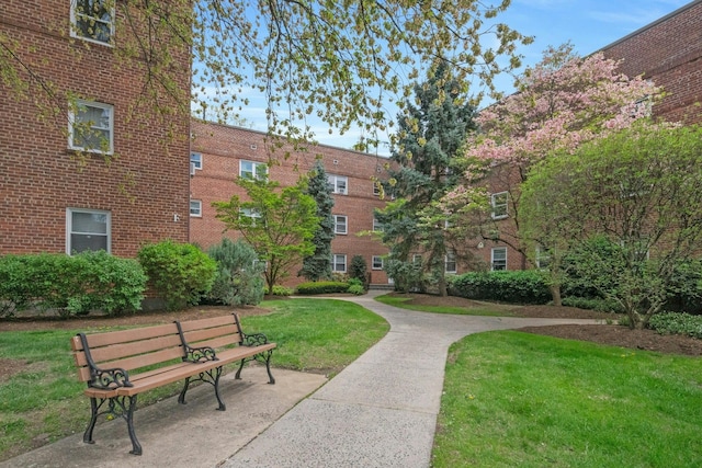 surrounding community with a yard