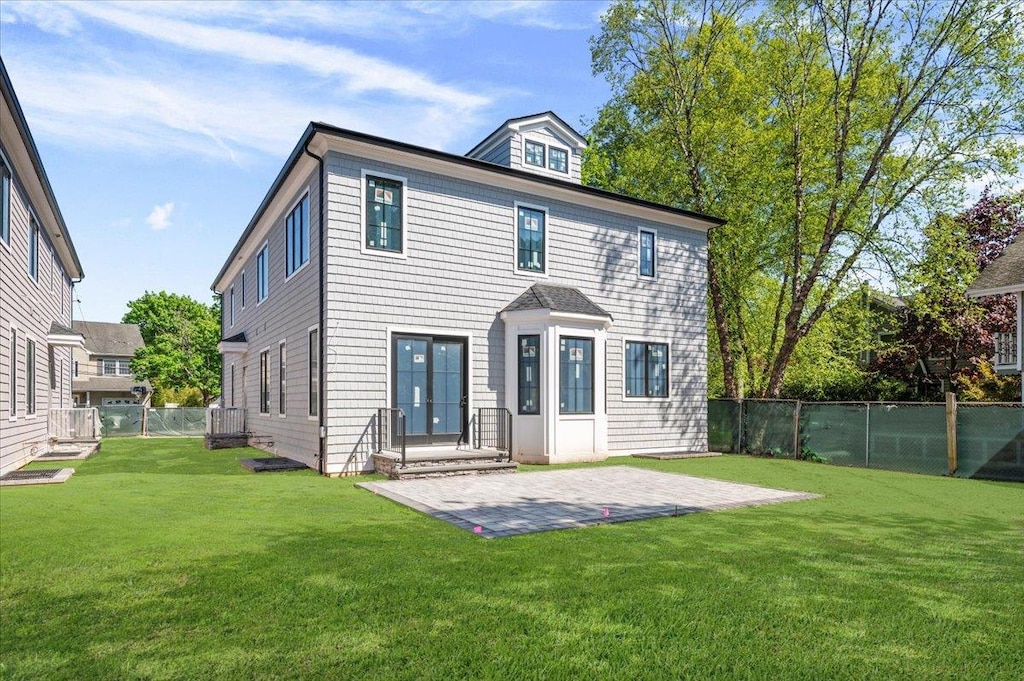 978 Singleton Ave, Woodmere, NY 11598 - back of property featuring a patio area