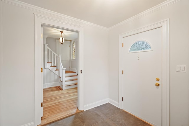 224 Leicester St, Port Chester, NY 10573 - foyer entrance featuring stairway, baseboards, crown molding, and a chandelier