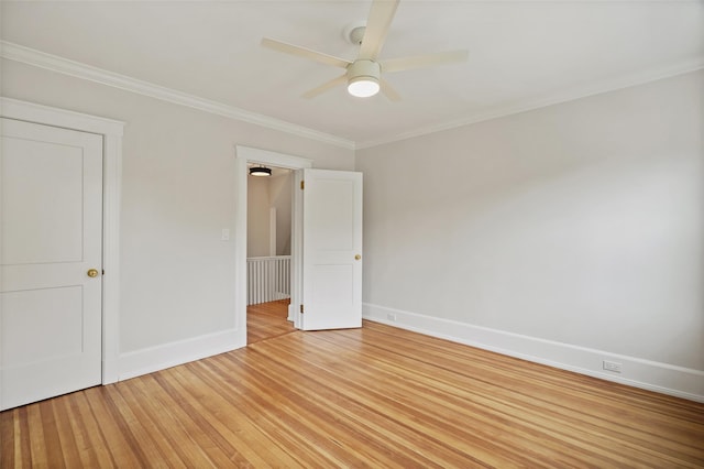 224 Leicester St, Port Chester, NY 10573 - unfurnished bedroom featuring light wood-type flooring, crown molding, baseboards, and a ceiling fan