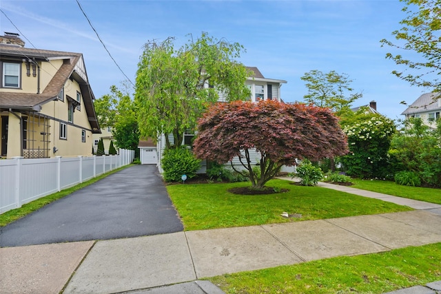 224 Leicester St, Port Chester, NY 10573 - view of front of home featuring a garage, driveway, and a shingled roof