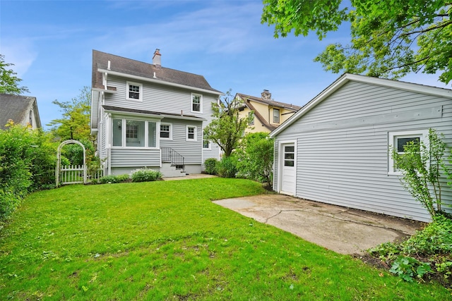 224 Leicester St, Port Chester, NY 10573 - back of house featuring a patio and a chimney