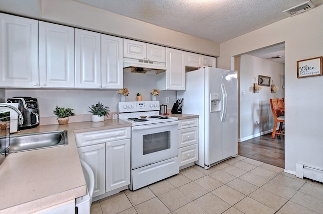 80 Saint Anns Ave, Copiague, NY 11726 - kitchen featuring white appliances, under cabinet range hood, white cabinetry, and a textured ceiling