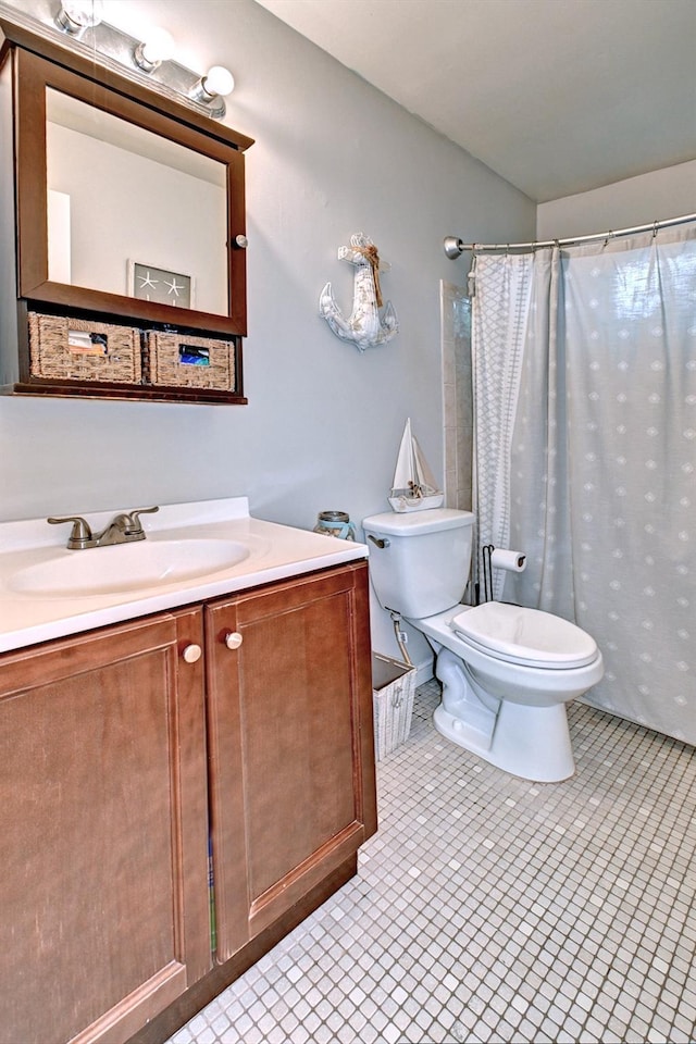 80 Saint Anns Ave, Copiague, NY 11726 - bathroom featuring toilet, vanity, tile patterned floors, and curtained shower