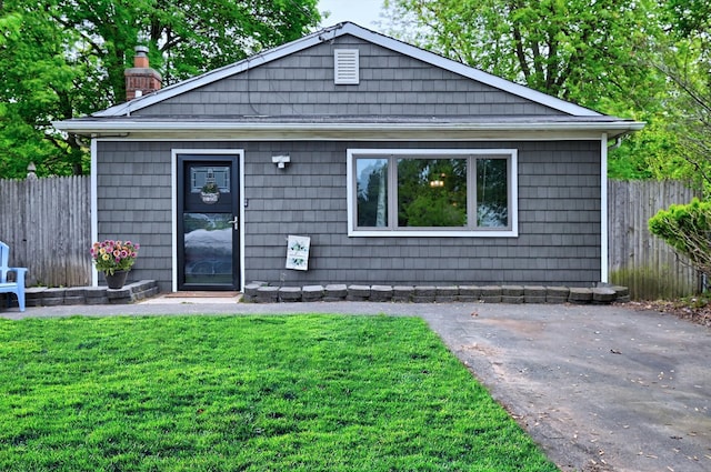 80 Saint Anns Ave, Copiague, NY 11726 - rear view of property with a chimney