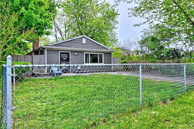 80 Saint Anns Ave, Copiague, NY 11726 - view of front of house with a chimney
