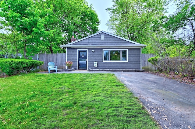 80 Saint Anns Ave, Copiague, NY 11726 - view of front of property featuring a chimney