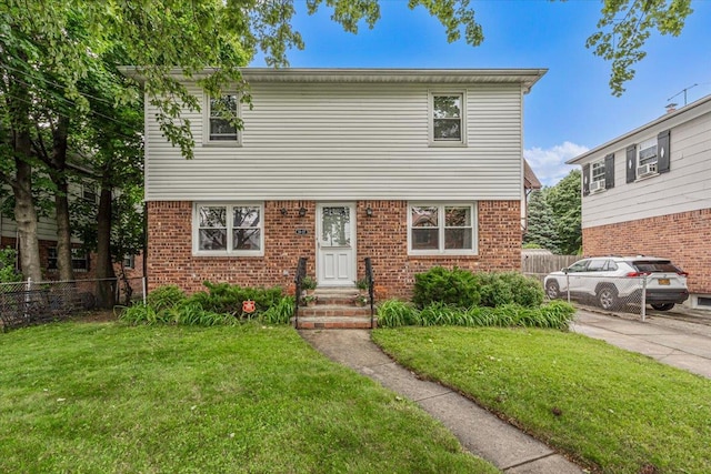 39-27 216th St, Bayside, NY 11361 - colonial inspired home featuring brick siding