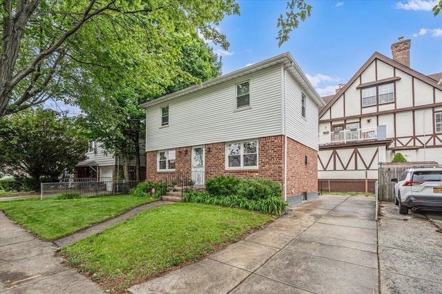 39-27 216th St, Bayside, NY 11361 - view of front of home with brick siding