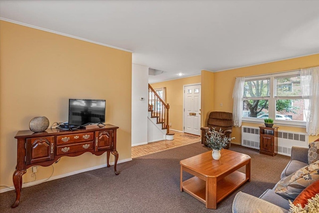 39-27 216th St, Bayside, NY 11361 - living room with radiator heating unit, stairs, carpet, baseboards, and crown molding