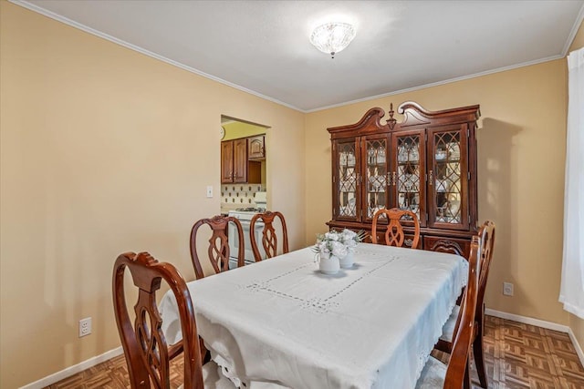 39-27 216th St, Bayside, NY 11361 - dining room with baseboards and crown molding