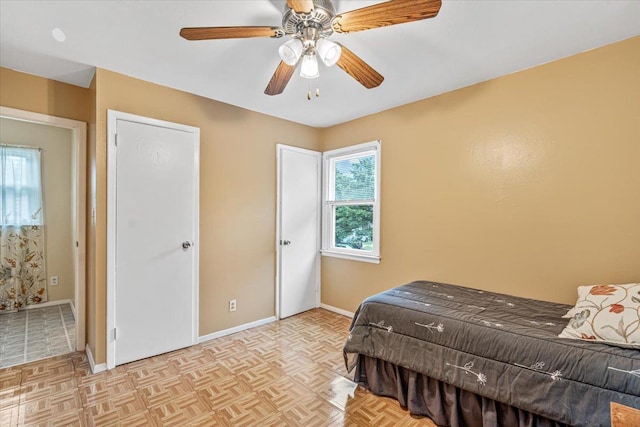 39-27 216th St, Bayside, NY 11361 - bedroom with baseboards and a ceiling fan