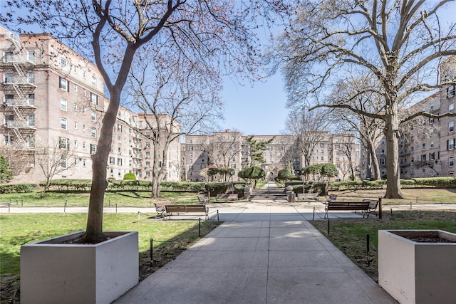 surrounding community featuring a lawn