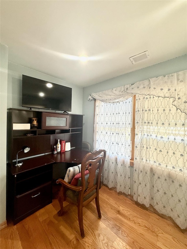 1601 Union Ave, Hewlett, NY 11557 - home office featuring visible vents and wood finished floors