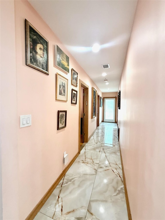 1601 Union Ave, Hewlett, NY 11557 - hallway featuring visible vents, marble finish floor, and baseboards