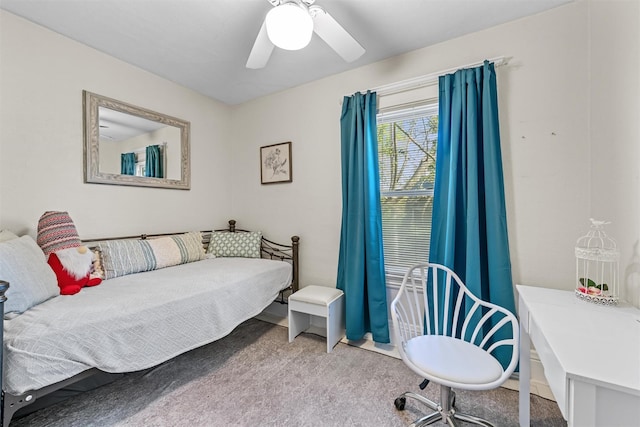 carpeted bedroom featuring a ceiling fan