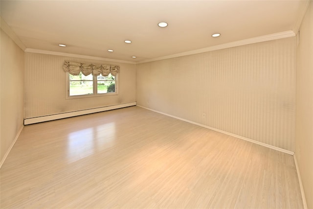 11 Sterling Rd, Spring Valley, NY 10977 - spare room featuring a baseboard heating unit, ornamental molding, light wood finished floors, baseboards, and recessed lighting