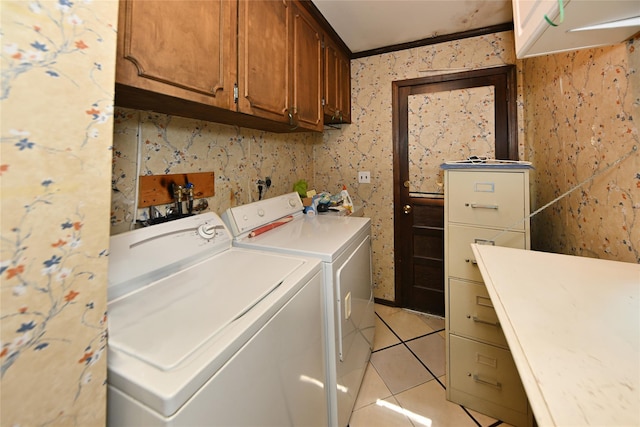 11 Sterling Rd, Spring Valley, NY 10977 - washroom with cabinet space, washing machine and dryer, wallpapered walls, light tile patterned floors, and crown molding
