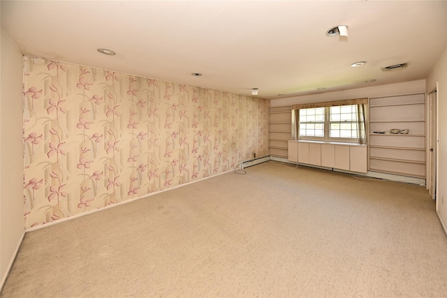11 Sterling Rd, Spring Valley, NY 10977 - unfurnished room with light colored carpet, a baseboard heating unit, recessed lighting, and wallpapered walls