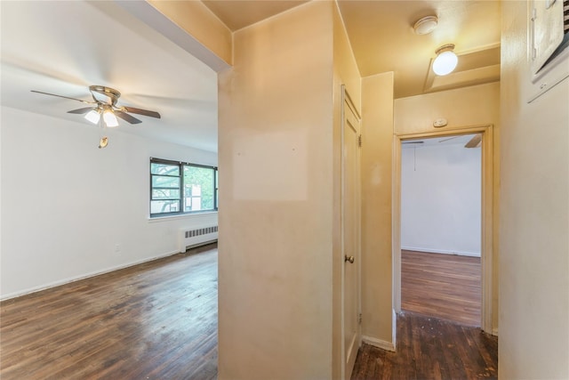 274 Cherry Valley Ave Unit B-2, Garden City, NY 11530 - hall featuring radiator, wood finished floors, and baseboards