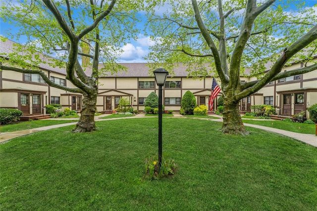 274 Cherry Valley Ave Unit B-2, Garden City, NY 11530 - view of property's community featuring a lawn and a residential view