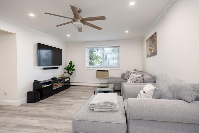 living room with recessed lighting, crown molding, ceiling fan, a baseboard radiator, and light wood-type flooring