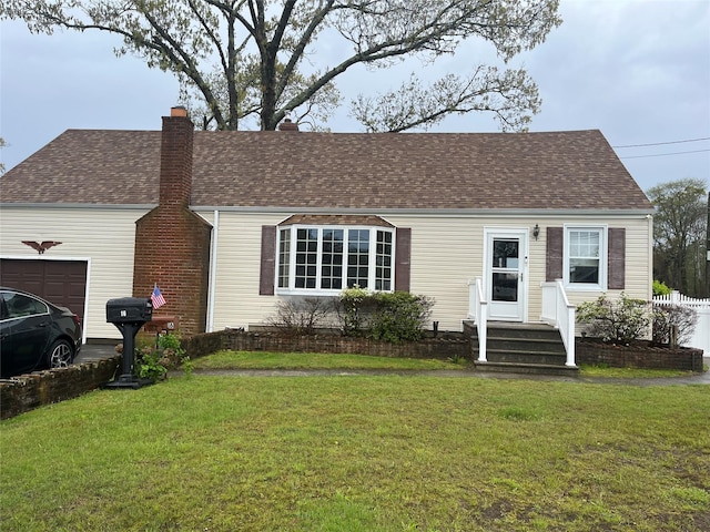 16 Edwards Ln E, Blue Point, NY 11715 - view of front of house with a garage, a chimney, a front yard, and roof with shingles
