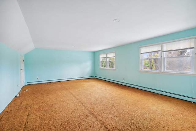 16 Edwards Ln E, Blue Point, NY 11715 - empty room featuring carpet, a baseboard heating unit, lofted ceiling, baseboard heating, and baseboards