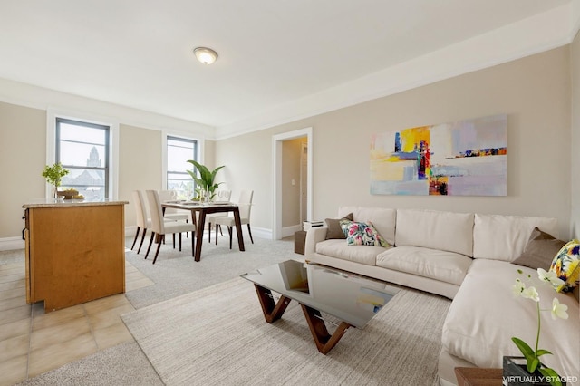 living room featuring baseboards