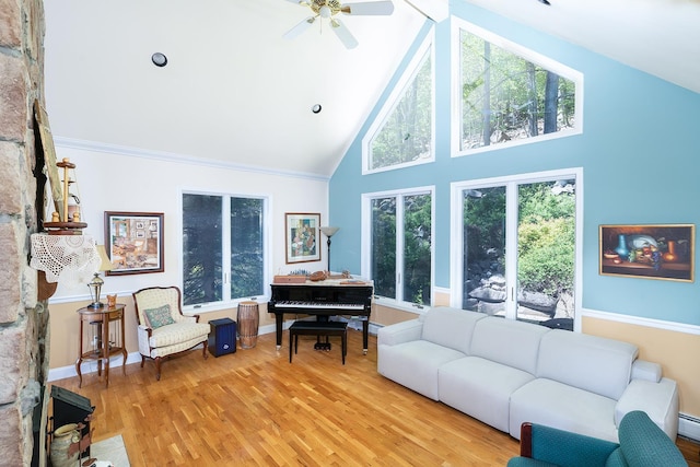235 S Blvd, Nyack, NY 10960 - living room featuring high vaulted ceiling, light wood-style flooring, ceiling fan, a baseboard heating unit, and baseboards