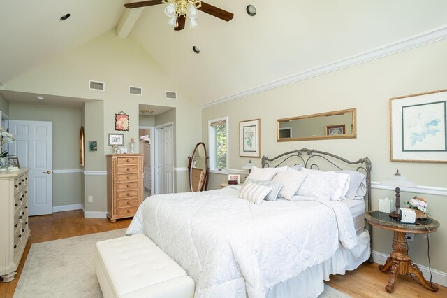 235 S Blvd, Nyack, NY 10960 - bedroom featuring beam ceiling, light wood-type flooring, high vaulted ceiling, a closet, and baseboards